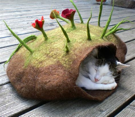 If you're ready to invest quite a lot of time and effort into this project to make your cat happy, this is a great choice for you. Katzenhohle: Handmade German Cat Caves • hauspanther