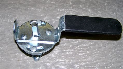Only use the emergency release handle when the garage door is closed. Garage Door Lock Handle