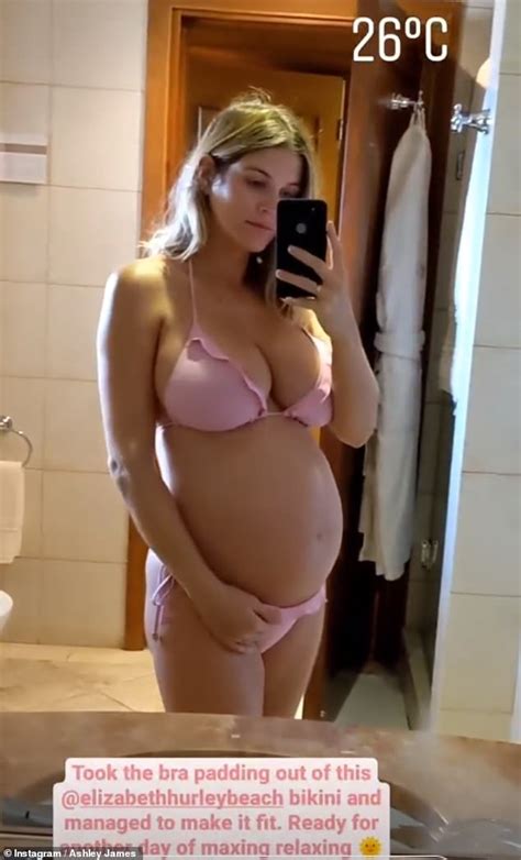 Pregnant Ashley James Embraces Her Ever Growing Bump In Pink Bikini