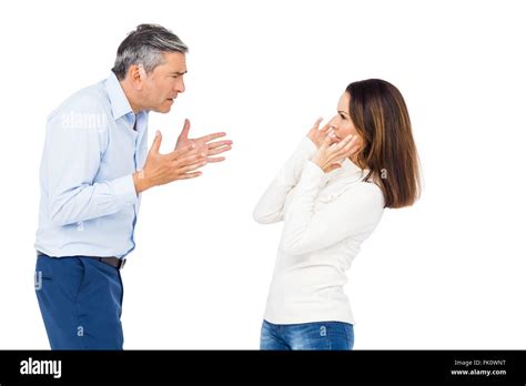 Annoyed Man Yelling At Wife Stock Photo Alamy