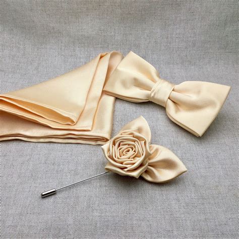 To recreate the look, fold a square napkin in half, then in half again, forming a smaller square. Champagne Bow tie Set, Rose Lapel Pin & Pocket Square, Champagne Bowtie for Wedding, Champagne ...