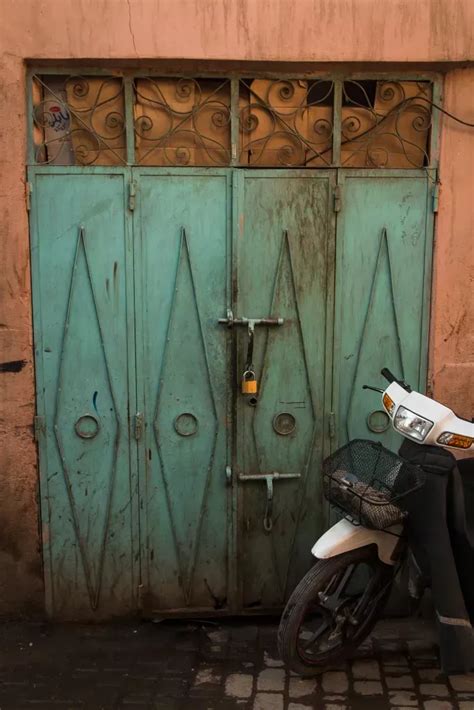 Motorbike In Front Of Teal Door Marrakech Metal Door Arboursabroad