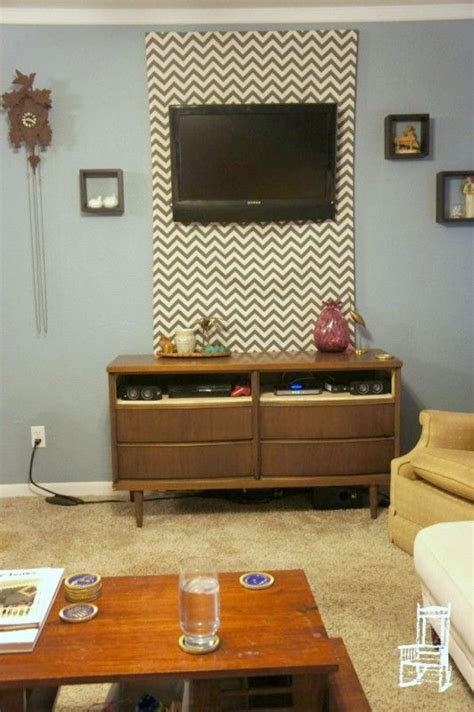 Hide Tv Cables With A Fabric Panel Behind A Wall Mounted Tv