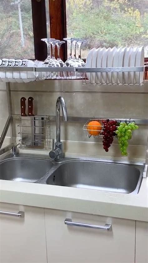 The expandable rack stretches to fit over most sinks, so wet dishes can drip directly down the drain. Dish Sink Drain Rack Video Video | Modern kitchen ...