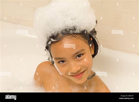 Year Old Girl In Bubble Bath Wearing Crown Of Bubbles Asian American