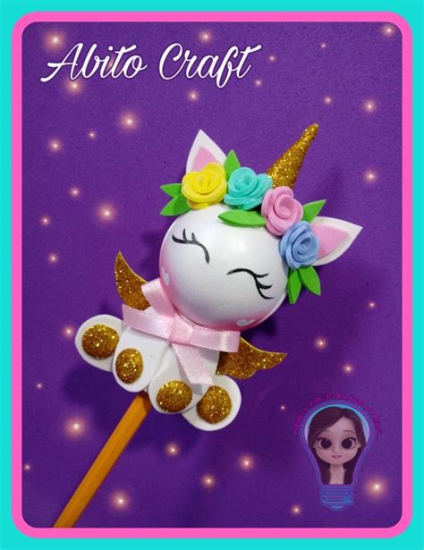 An Image Of A Unicorn Wand With Glitter On Its Head And Flowers In Her