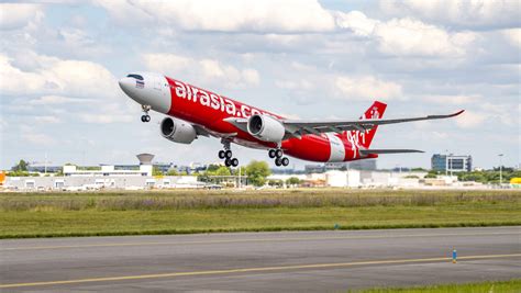 Air Asia Group To Retain All Staff But With Pay Cuts Business Traveller