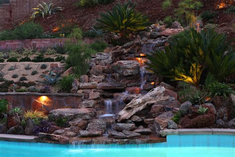 Try these drainage solutions to keep your yard above water. Singing Gardens | Blog | Steep Slope Landscaping