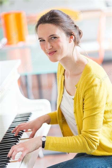 Woman Playing Piano Stock Image C0341238 Science Photo Library