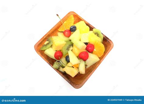Small Pieces Of Fruit Cut Up On A Wooden Bowl Stock Image Image Of