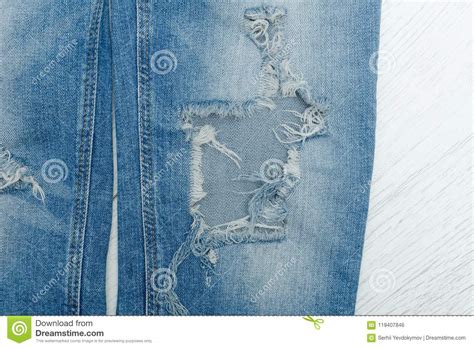 Part Of Blue Ripped Jeans Details Close Up Stock Photo Image Of