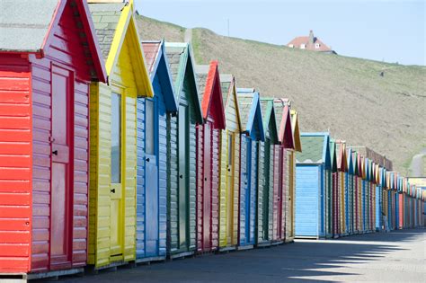Free Stock Photo 7956 Row Of Colourful Beach Huts Freeimageslive