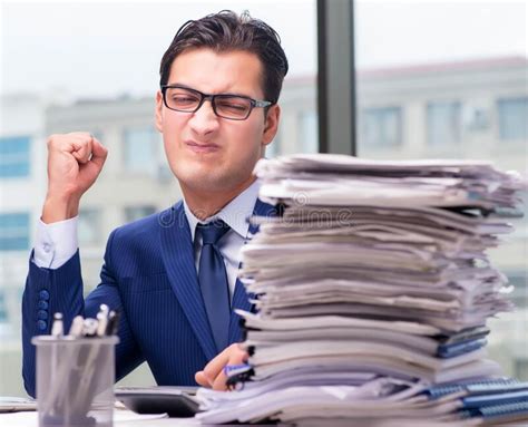 The Workaholic Businessman Overworked With Too Much Work In Office
