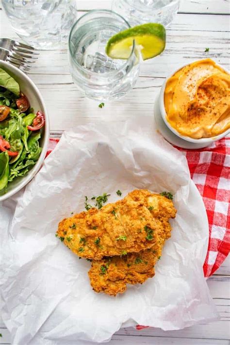 Then, add your seasonings and place them in the air fryer. Air Fryer Fried Chicken - Gluten-Free, Low-Carb, Keto ...