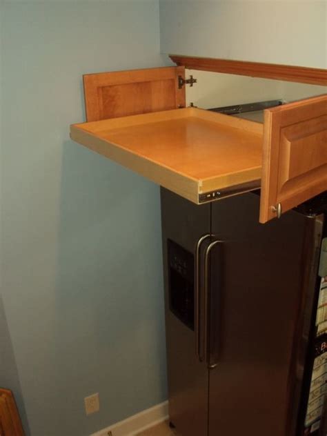 As of july 2018, the natural options like orange oil fumigants mean the homeowners have to remove very little, but still have a 99.3 percent success rate in killing pests. Pull Out Shelf Above the Refrigerator - Kitchen Drawer Organizers - other metro - by ShelfGenie ...