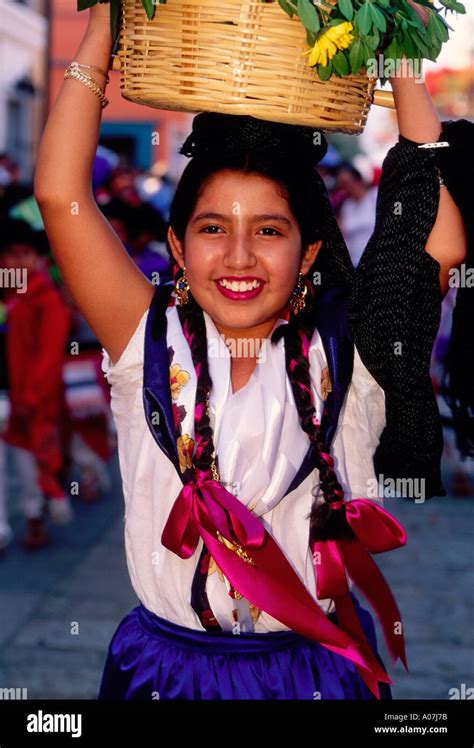 1 one mexican girl costumed dancer eye contact front view portrait guelaguetza festival