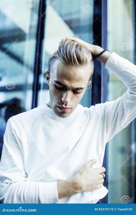 Young Modern Hipster Guy At New Building University Blond Fashion