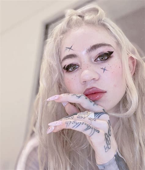 Grimes Debuts New Gnarly White Ink Alien Scars Full Back Tattoo