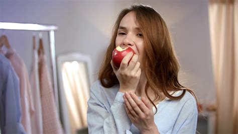 Happy Woman Eating Red Apple At Morning Close Up Of Smiling Woman Eat