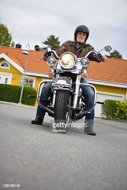 Old Man Riding Motorcycle Photos And Premium High Res Pictures Getty