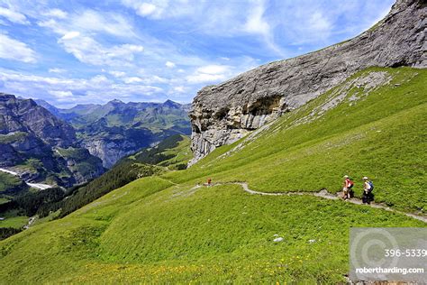 Hikers At Kleine Scheidegg Grindelwald Stock Photo