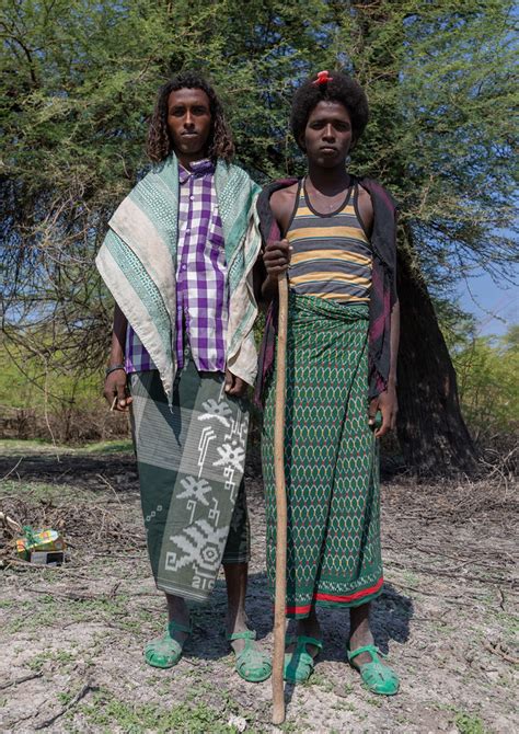 African tribe men photos and images. Afar tribe men with hairstyles showing their marital statu ...