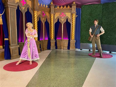 Photos Videos New Distanced Princess Character Meet And Greets With Rapunzel Snow White Ariel