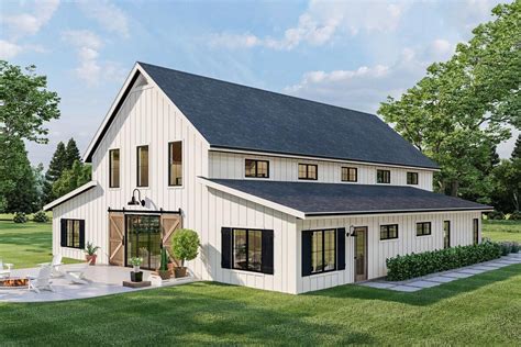 Barndominium Style House Plan With Home Office And Two Story Great Room