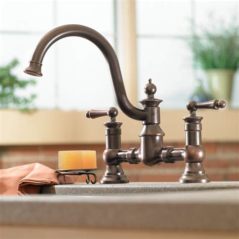 Classic stainless finish for a touch of elegance and the feeling of luxury. Moen S713 Waterhill Two-Handle High-Arc Kitchen Faucet ...