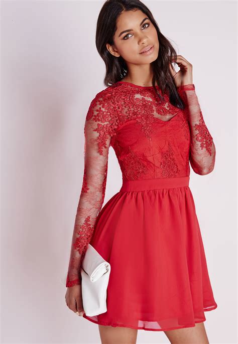 Swap out your summer minis for long sleeve dresses. Missguided Premium Lace Long Sleeve Skater Dress Red in ...