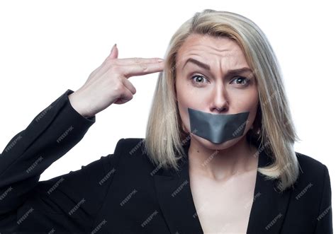 Premium Photo Girl With A Mouth Taped On A White Background