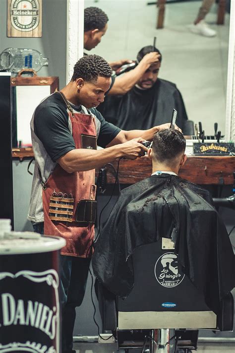 Hd Wallpaper Person Cutting Hair Of Man Barber Barbershop Facial Expression Wallpaper Flare