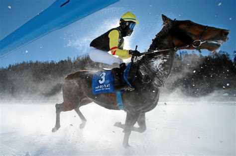 White Turf International Horse Races Are Run On A Frozen Lake
