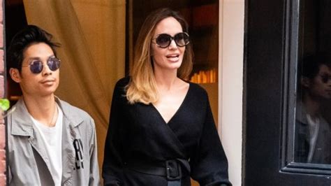 Angelina Jolie Adds A Classic Dress To Her 70s Inspired Summer