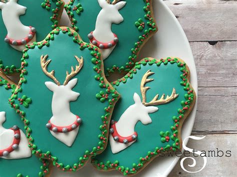 Use die cuts to make gingerbread men. How To Decorate Reindeer CookiesSweetAmbs
