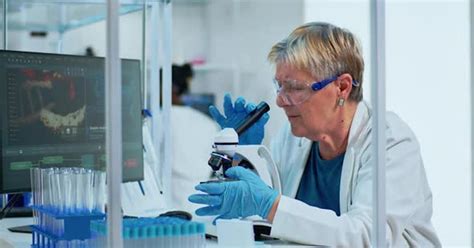 Elderly Biotechnology Scientist Researching In The Laboratory Medical