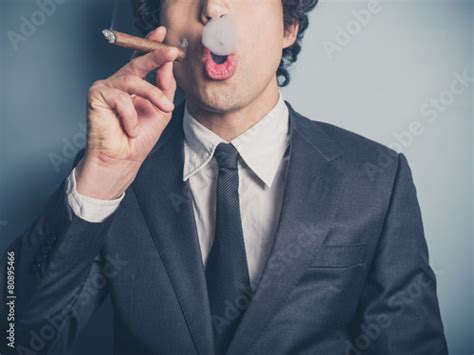 Young Businessman Blowing Smoke Rings Stockfotos Und Lizenzfreie