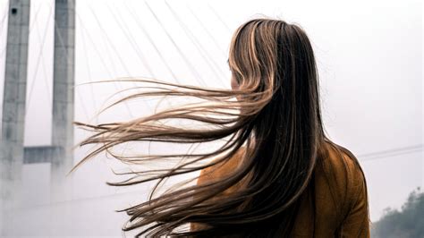 Girl With Hair Blowing In The Wind