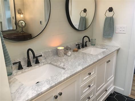 Rounded vessel sinks balance the straight, sharp angles of the mirrors above. Wayfair double vanity with oil rubbed bronze round mirrors ...