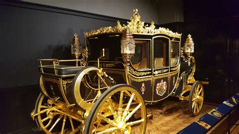 See The Royal Carriages Behind Buckingham Palace