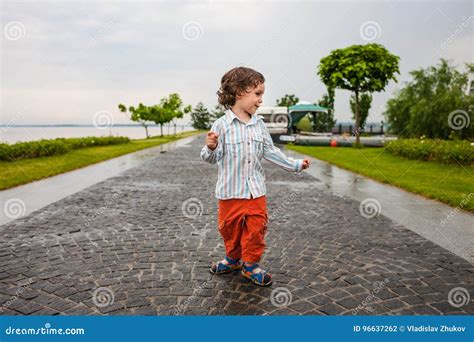 The Boy Is Walking In The Park Stock Photo Image Of Runner Park