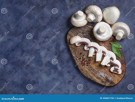 Fresh Champignons On Dark Grey Background Whole Button Mushrooms And