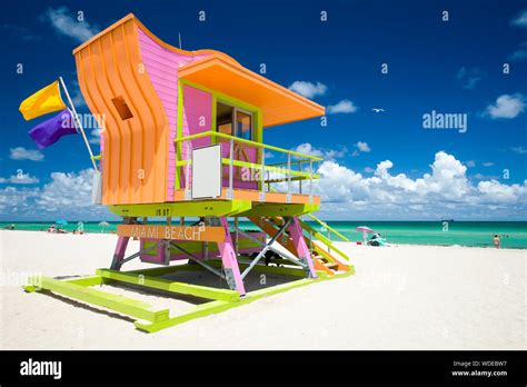 Vibrant Sunny View Lifeguard Tower Painted Bright Colors Under Blue Sky