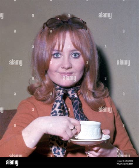 British Pop Singer Lulu Relaxes With A Cup Of Tea At Her Home In London