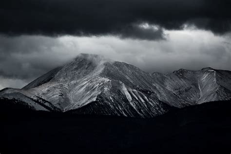Snow Capped Mountain Range Under Nimbus Clouds Shown Free Image Peakpx