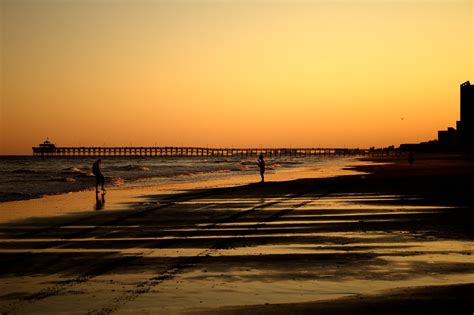 Cherry Grove Pier At Sunset Tide Coming In While The Sun S Flickr
