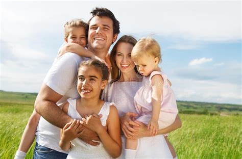 Three families part i (2010). Happy Young Family With Three Children Stock Image - Image of caucasian, sister: 28925355