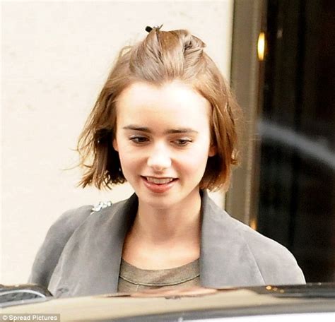 Lily Collins Goes For The Revealing Look In See Through Knit Sweater