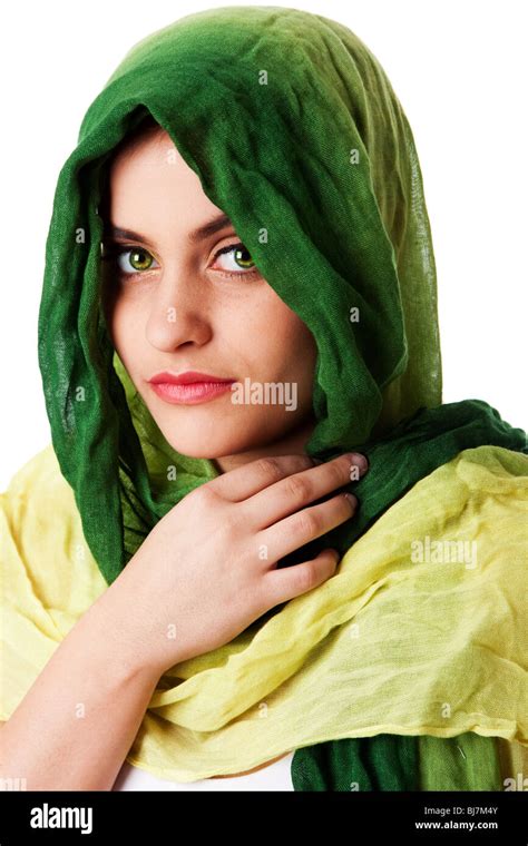 portrait of mysterious beautiful caucasian middle eastern woman face with green penetrating eyes