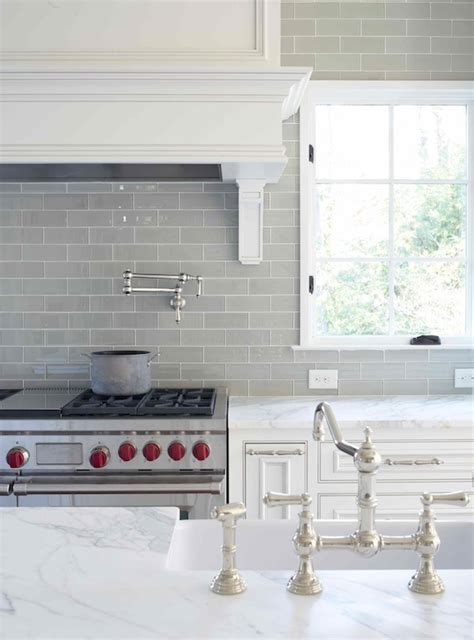 Husband has a good eye for granite! Gray Glass Subway Tile - Transitional - kitchen - L. Kae Interiors